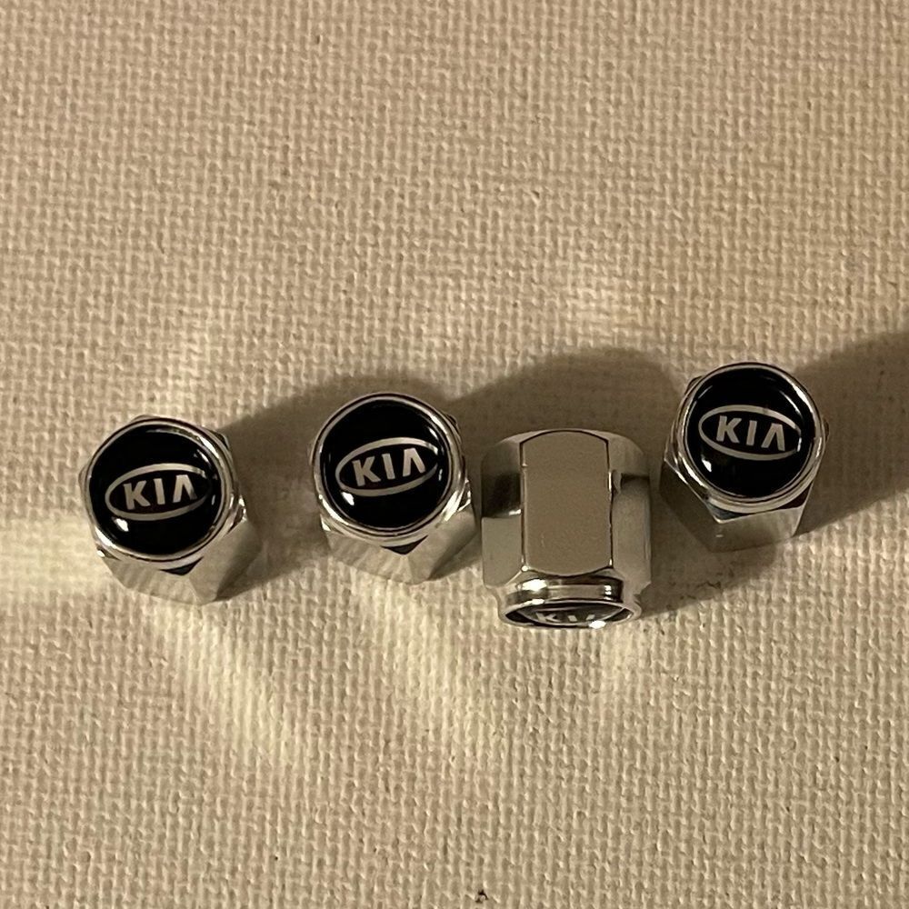 Kia valve stem caps in silver set of 4 NWT